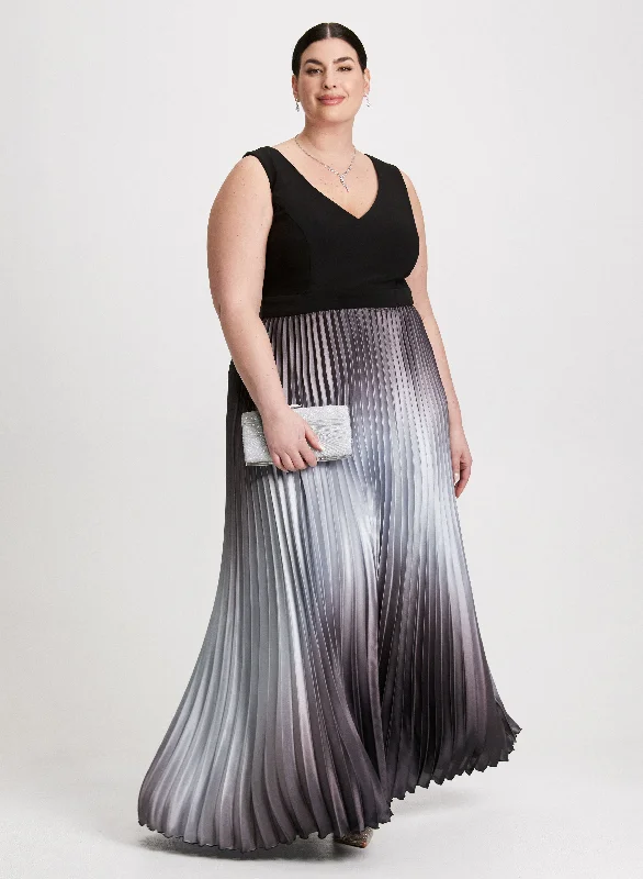 Midi dresses with keyhole backs for a flirty and unexpected detailSleeveless V-Neck Pleated Dress Midi dresses with keyhole backs for a flirty and unexpected detailSleeveless V-Neck Pleated Dress